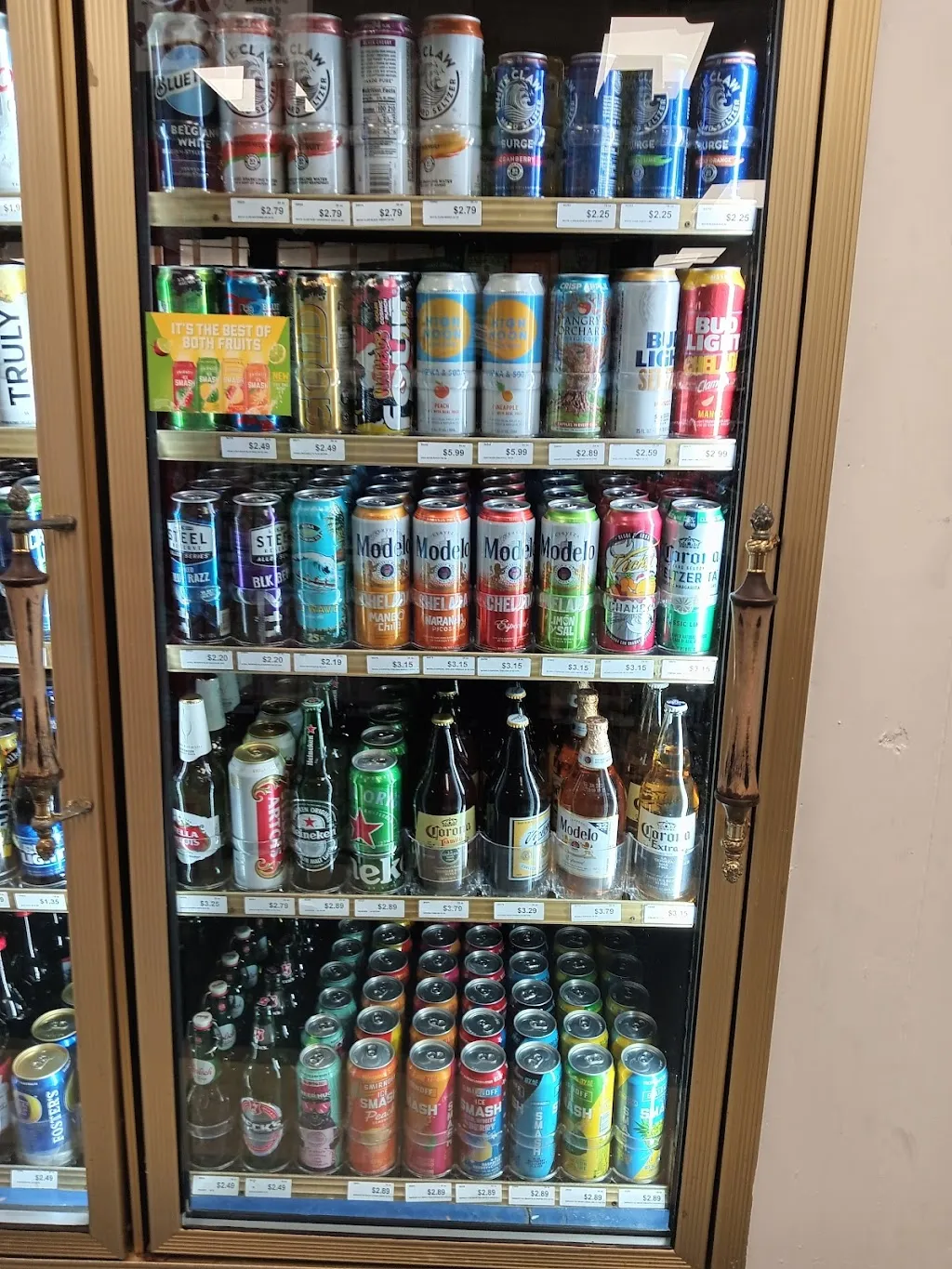 Beer and hard seltzers in a refrigerator at Circle Liquor Store