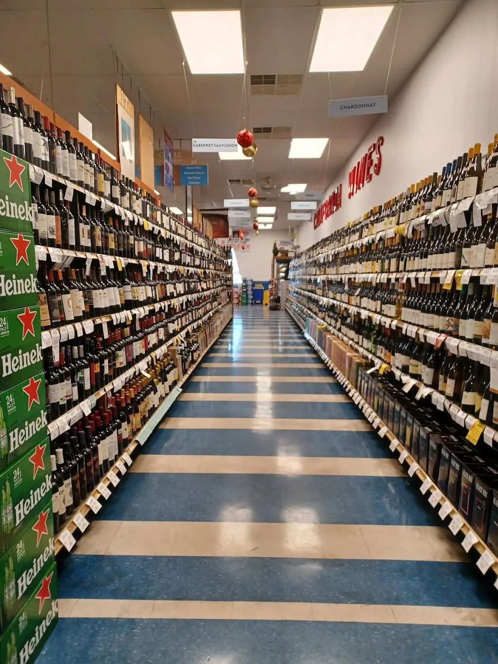 Wine bottles lining the shelves at Circle Liquor Store